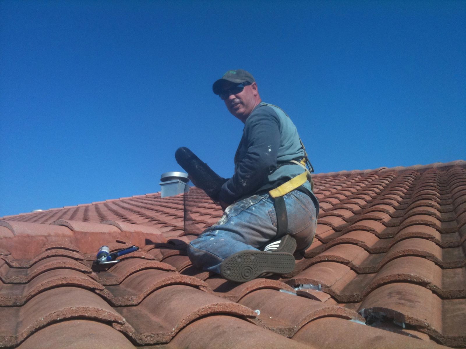 Specialist sealing entry points on a tile roof